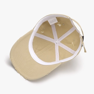Internal view of khaki cotton baseball cap showing 6-panel design and adjustable buckle