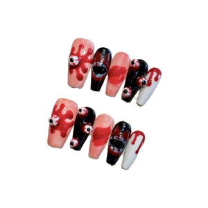 Handmade press-on nails with 3D eyeballs and blood splatter design for Halloween