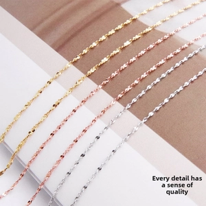 Detailed view of S925 sterling silver chains in gold, rose gold, and silver finishes