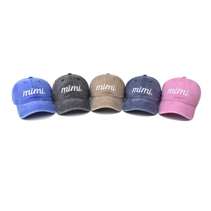 Five assorted colors of vintage washed cotton baseball caps with mimi embroidery