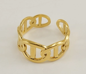Macro shot of 18k gold plated stainless steel ring with anchor chain design detail