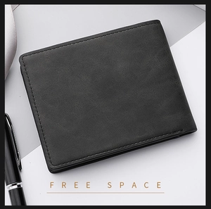 Close-up of minimalist black leather bifold wallet with fine stitching and matte texture