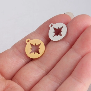 Mirror polished stainless steel star compass pendants in gold and silver finishes
