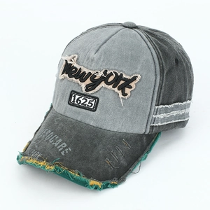 Vintage washed baseball cap in grey with New York embroidery and distressed brim details