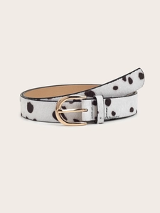 Close-up of animal print leather belt with calf hair texture and gold pin buckle
