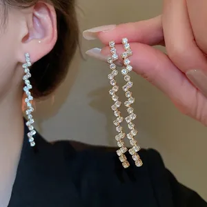 Elegant Z-shaped tassel earrings with high-grade zircons for a luxury shimmering look