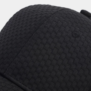 Detailed close-up of the black waffle texture fabric on this breathable baseball cap