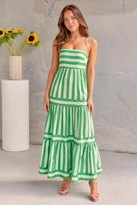 Detailed view of backless green and white striped maxi dress with functional side pockets
