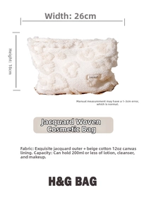 Detailed size view of a white plush heart makeup bag measuring 26cm by 18cm with zipper