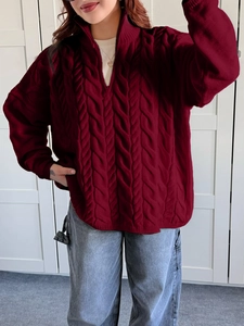 Women's red cable knit sweater with half-zip collar and relaxed casual holiday fit