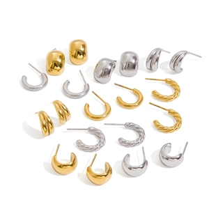 Set of gold and silver C-shaped geometric titanium steel hoop earrings with various textures
