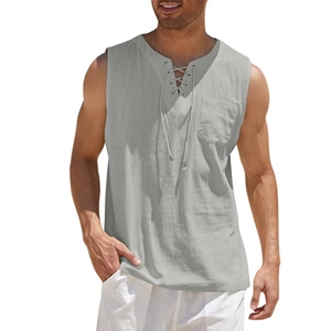Detail view of lace-up V-neck and chest pocket on men's linen blend sleeveless shirt