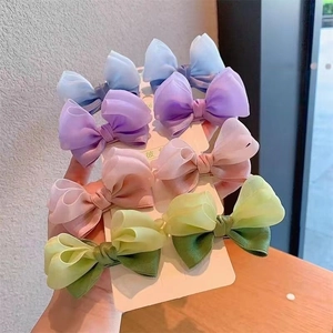 Set of 8 colorful organza bow hair clips in pastel shades for toddler girls