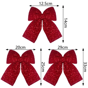 Three sizes of red sequin Christmas bows with detailed measurements on white background