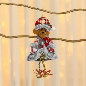 Close-up of plush Christmas bear ornament with checkered hat and tiny golden bells