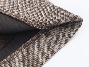 Detailed macro view of the tweed fabric texture and durable inner lining of this dress