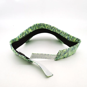 Detail view of the moisture-wicking inner lining and adjustable strap of the sun visor