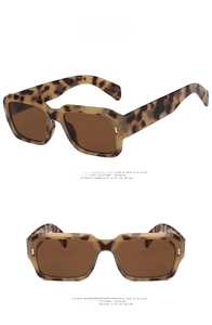 Detail of leopard print tortoiseshell sunglasses with brown lenses from front and side views