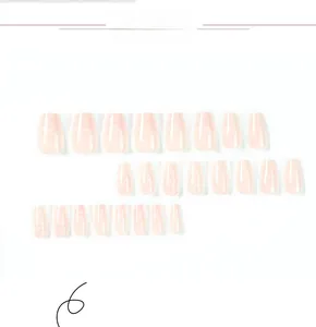 Detailed set of 24 nude pink gradient press-on nails in medium coffin shape