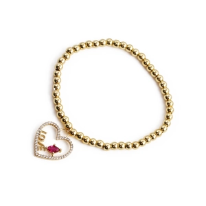 Elastic gold beaded heart bracelet with red marquise stone and LOVE engraving