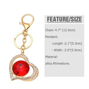 Detailed size specifications for heart-shaped rhinestone keychain pendant in gold and red