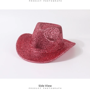 Side view detail of a vibrant pink glitter cowboy hat for disco party celebrations
