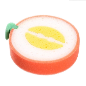 Macro shot of fruit-shaped kitchen sponge with layered foam and porous texture details