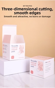 Detail view of eco-friendly paper packaging boxes with bamboo illustration for makeup pads