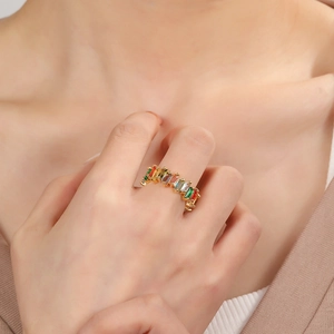 Geometric 18K gold plated ring with rainbow AAA cubic zirconia on a female hand