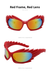 Detail view of red flame-style sunglasses with jagged edges and mirrored lenses