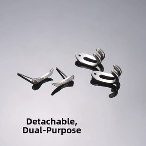 Macro shot of detachable punk hoop earrings in silver metal with two-way wearing style