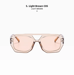 Close-up of light brown translucent polygon sunglasses with double bridge detail