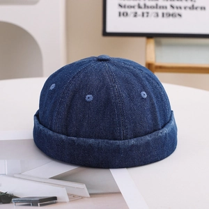 Classic deep blue denim miki hat with six-panel structure and vintage docker cap style