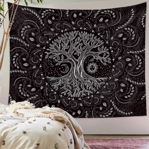 Detailed texture of black and white Tree of Life tapestry with sun and moon pattern