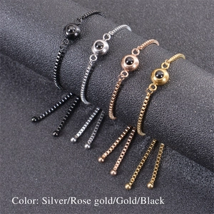 Set di bracciali a proiezione regolabili in argento, oro rosa, oro e acciaio nero