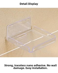 Détail de l'étagère murale transparente avec bande adhésive nano sans dommages au mur