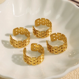 Set of four 18k gold plated stainless steel rings with hollow woven design for women