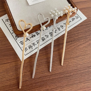 Elegant Chinese pearl hairpins in gold and silver metal, featuring heart and cluster designs