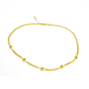 Detailed macro of gold-plated cuban chain with colorful evil eye enamel drop charms