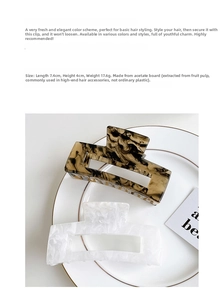 Detail view of acetate hair claws in amber and marble patterns on a white porcelain dish