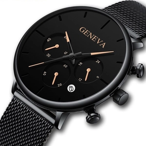 Close-up of black mesh strap watch with decorative three-eye dial and date window