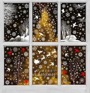 Christmas window stickers set featuring reindeer and snowflake decals on glass pane