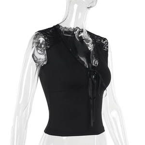 Detail of black lace patchwork on a slim fit v-neck tank top with tie-up front