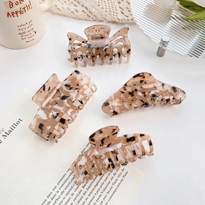 Set of 4 large tortoiseshell leopard print hair claws in minimalist acetate design