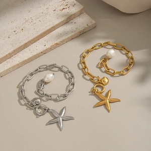 Détails de bracelets perles et étoile de mer or et argent avec fermoir à bascule