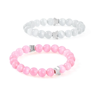 Minimalist pink and white cat eye beaded bracelet with silver butterfly charms