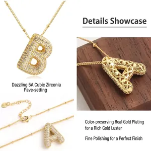 Gold plated balloon letter necklace with 5A zircon inlay and hollow heart design