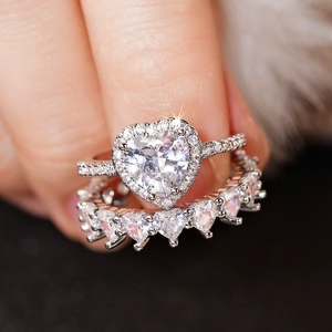 Elegant silver heart-shaped zircon ring set with halo and matching pavé band
