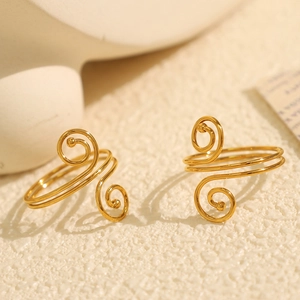 Minimalist spiral open gold rings with elegant curved design for a modern artistic style