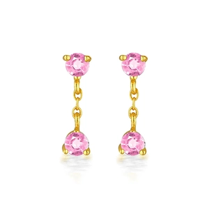 Detail of pink zircon double drop earrings with golden chains in 3-prong setting